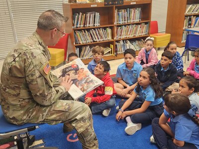 Fort Buchanan commander honors military children during visit at elementary school on Puerto Rico