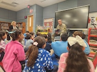 Fort Buchanan commander honors military children during visit at elementary school on Puerto Rico
