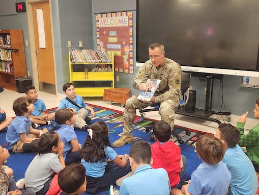 Fort Buchanan commander honors military children during visit at elementary school on Puerto Rico