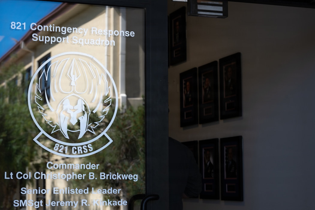 Squadron logo on glass door.