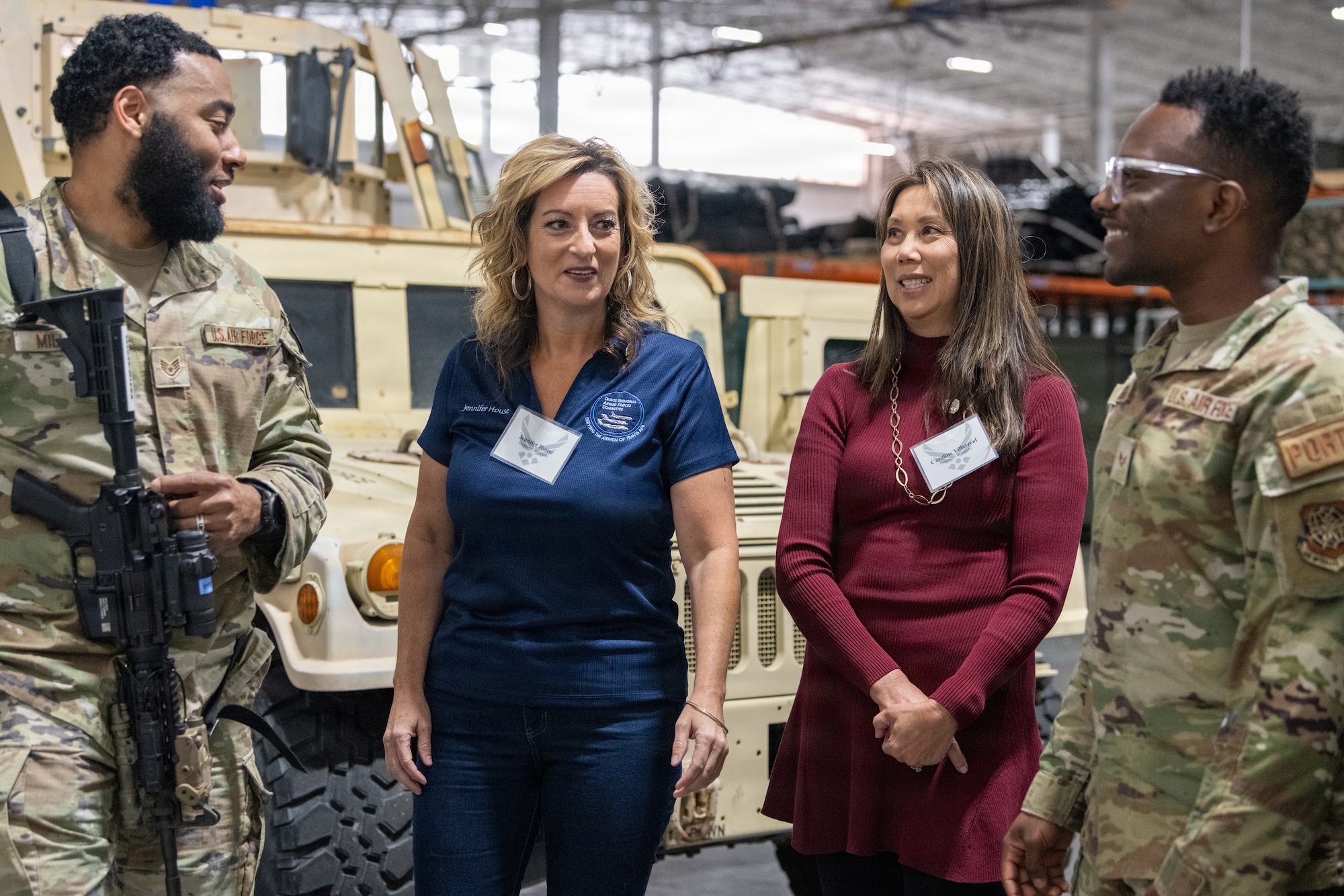 Honorary Commanders speak with Airmen.