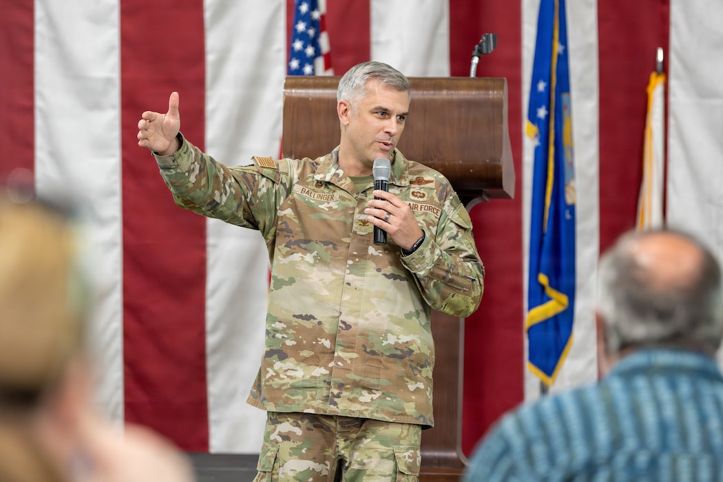 An Air Force Colonel speaks at the Honorary Commander immersion tour.