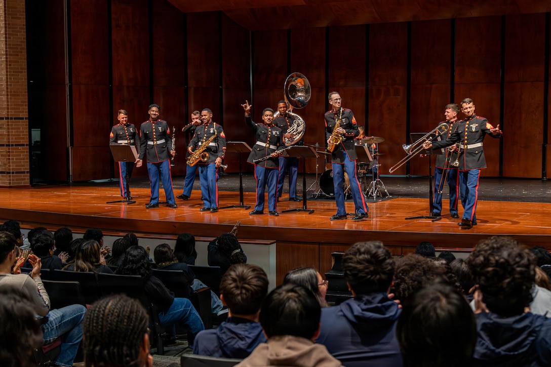 U.S. Marines with the Marine Forces Reserve Brass Band perform for students at Alief Taylor High School in Houston, Texas, March 2, 2026. The performance was in conjunction with school visits to engage with students and highlight career opportunities in the Marine Corps band. (U.S. Marine Corps photo by Cpl. Christian Salazar)