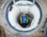 An Airman descends a ladder into a launch facility.