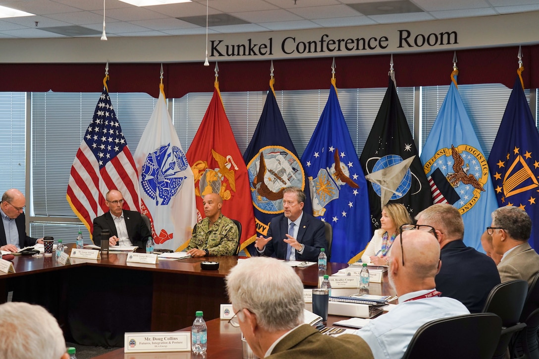 leaders briefing around table