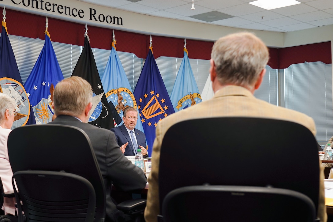 leaders briefing around table