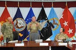 leaders briefing around table