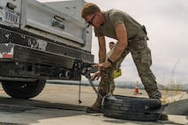 person pulls chain on truck