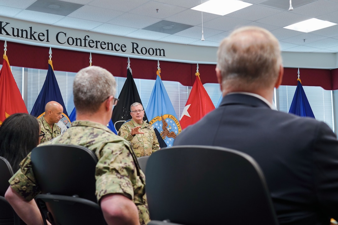 leaders briefing around table