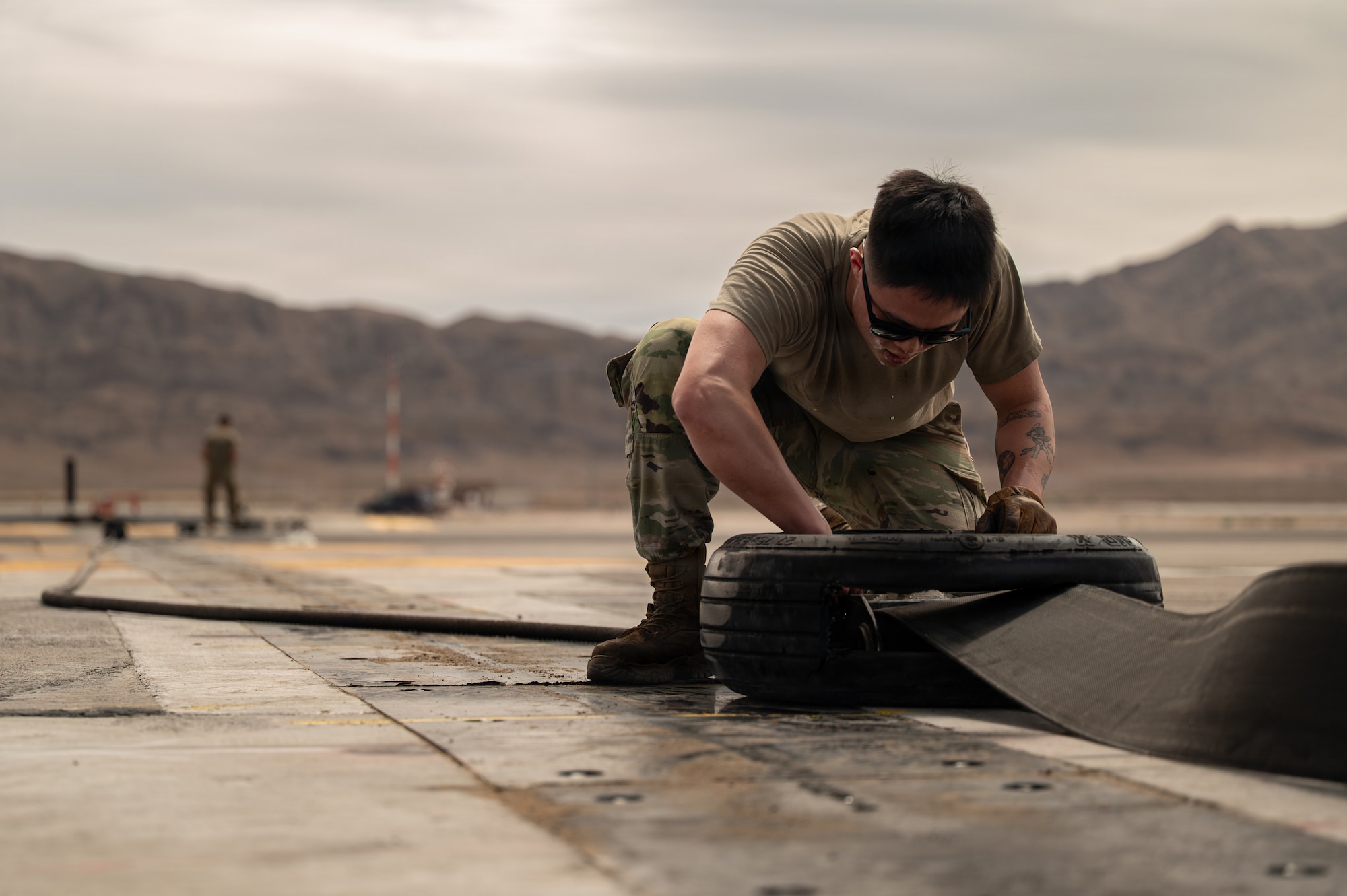 person crouched on ground