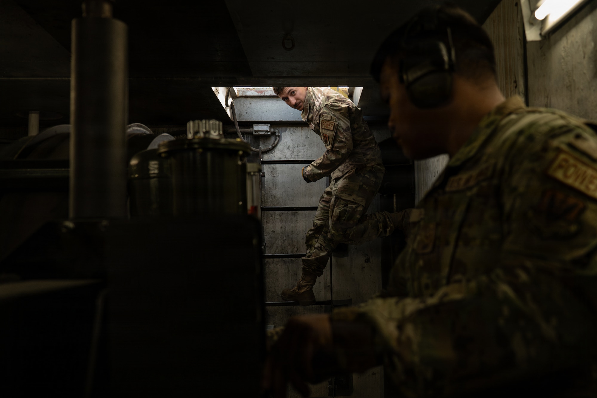 person climbs ladder