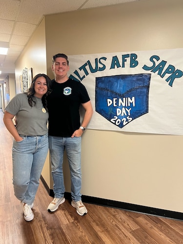 U.S. Air Force Maj. Jeremy Delzer, 56th Air Refueling Squadron KC-46 Pegasus aircraft instructor pilot and demo team lead, poses for a photo with his wife, Stephanie Delzer, Sexual Assault Prevention and Response victim advocate, at Altus Air Force Base (AFB), Oklahoma, April 25, 2025. Since Jeremy was assigned to Altus in 2023, Stephanie quickly became an integral part of the mission, first serving as a victim witness assistant program coordinator and discharge clerk for the Altus AFB legal office before transitioning in 2024 to her current role as a Sexual Assault Prevention and Response victim advocate on base. (Courtesy photo)