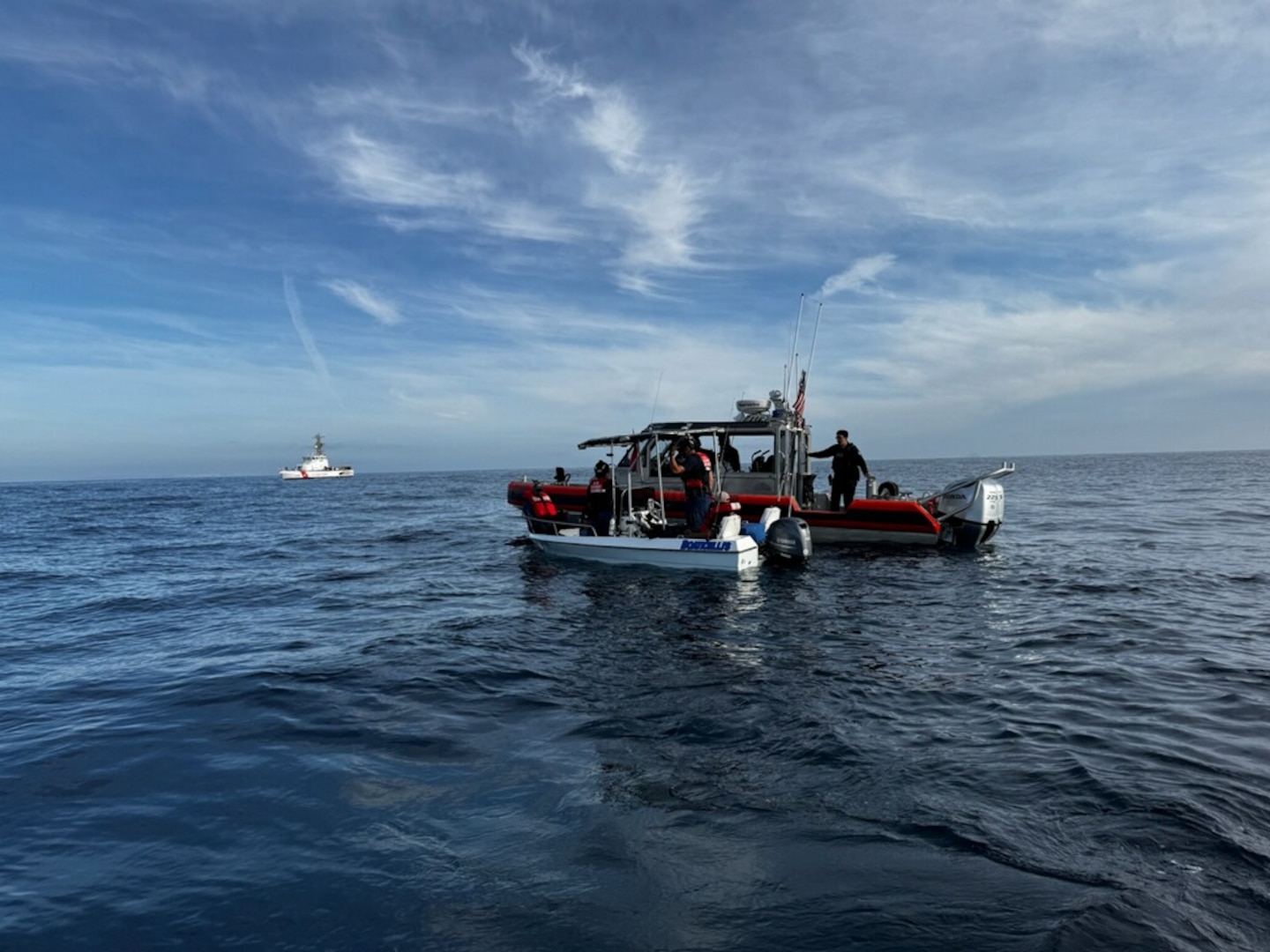 A Coast Guard boarding team assigned to the 87-foot Marine Protector-Class Coast Guard Cutter Narwhal (WPB-87335) conducts a boarding of a suspected alien-smuggling vessel near Point Loma, California, April 9, 2026. During the boarding, three suspected aliens were identified, all claiming Mexican nationality. (U.S. Coast Guard courtesy photo)