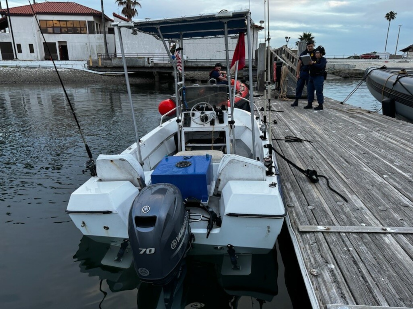 Coast Guard members conduct a report of boarding near a vessel used to transport three suspected aliens in San Diego, California, April 9, 2026. A Coast Guard boarding team assigned to the 87-foot Marine Protector-Class Coast Guard Cutter Narwhal (WPB-87335) interdicted the aliens approximately 5 miles offshore of Point Loma. (U.S. Coast Guard courtesy photo)