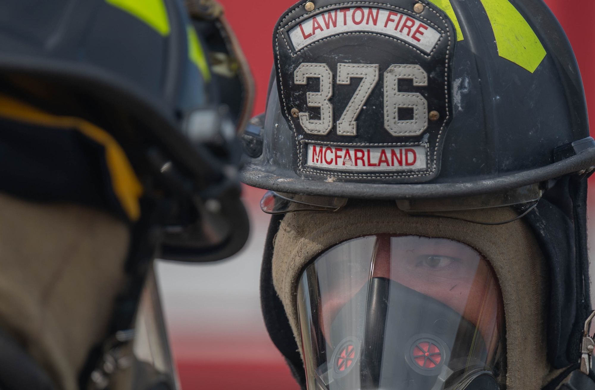 Justin L. McFarland, Lawton Fire Department firefighter, completes a safety check before participating in a live fire training exercise at Altus Air Force Base (AFB), Oklahoma, April 7, 2026. This joint exercise ensured both Altus AFB and Lawton Fire Department personnel met certification requirements for aircraft rescue and firefighting operations. (U.S. Air Force photo by Airman 1st Class Emma Wright)