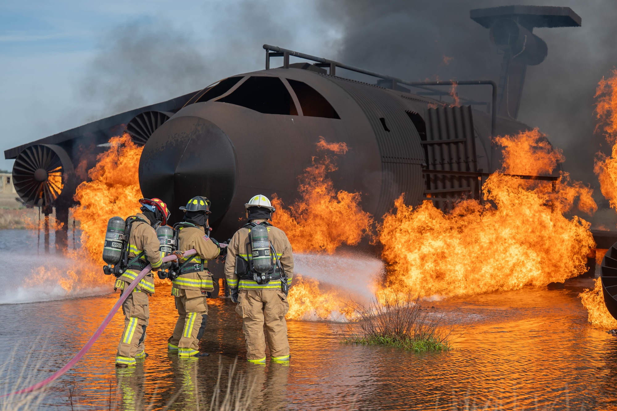 Members of the Altus Air Force Base Fire Department conduct a live fire training exercise at Altus Air Force Base (AFB), Oklahoma, April 7, 2026. Members of the Altus AFB Fire Department conducted a joint live fire training exercise with the Lawton Fire Department. (U.S. Air Force photo by Airman 1st Class Emma Wright)