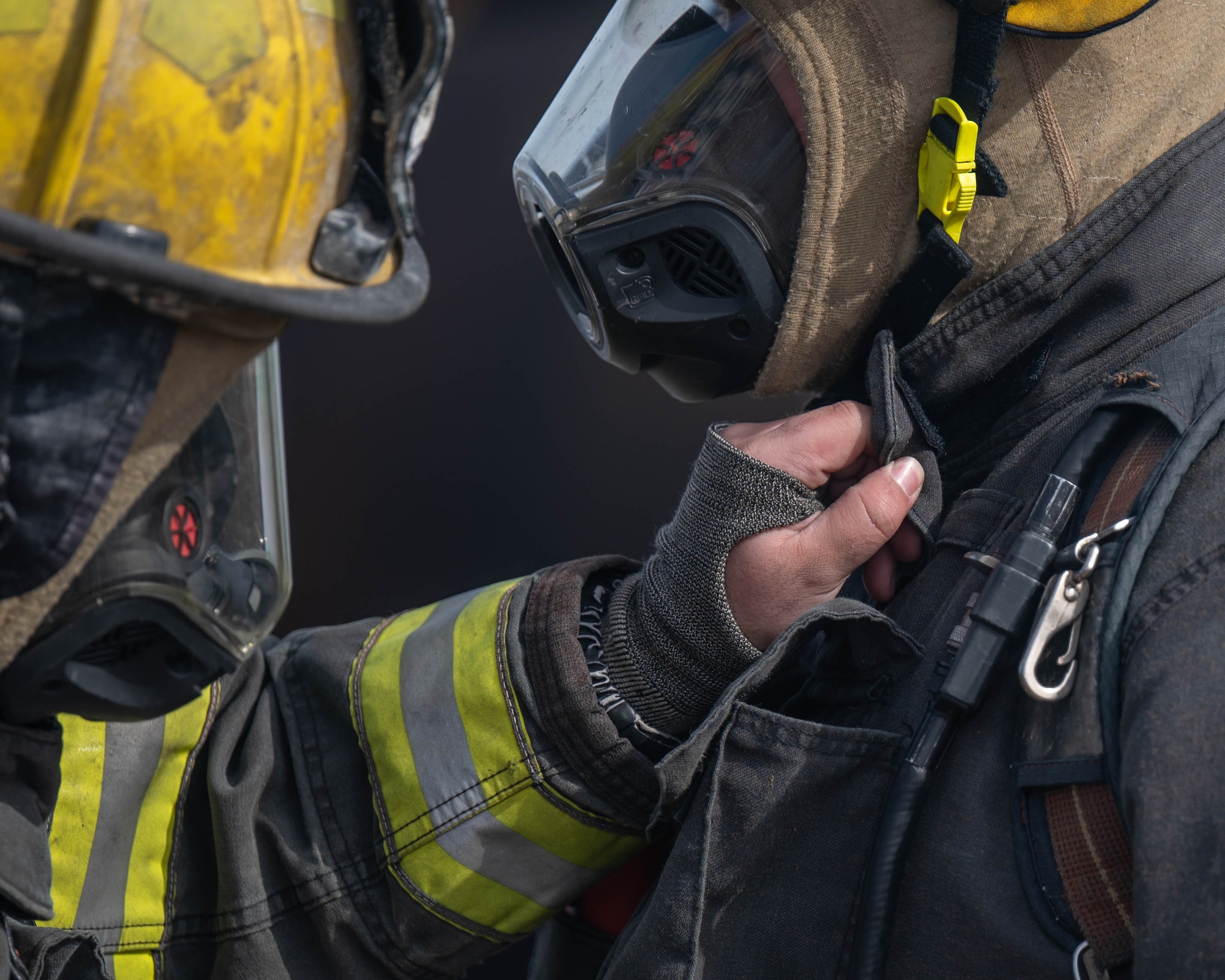 Members of the Lawton Fire Department complete safety checks before participating in a live fire training exercise at Altus Air Force Base, Oklahoma, April 7, 2026. Safety checks are required to be completed before participating in live fire training. (U.S. Air Force photo by Airman 1st Class Emma Wright)