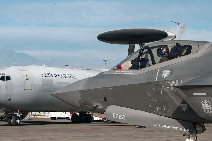 U.S. Air Force Maj. Sean Loughlin, pilot and commander of the F-35A Lightning II Demonstration Team, performs pre-flight checks during Feria Internacional del Aire y del Espacio 2026 in Santiago, Chile, April 8, 2026. The Air Force has sent diverse capabilities such as the F-35A Demonstration Team to FIDAE for the past several iterations, highlighting collaboration and innovation with regional partners across the air and space domain. (U.S. Air Force photo by Airman 1st Class Samantha Melecio)