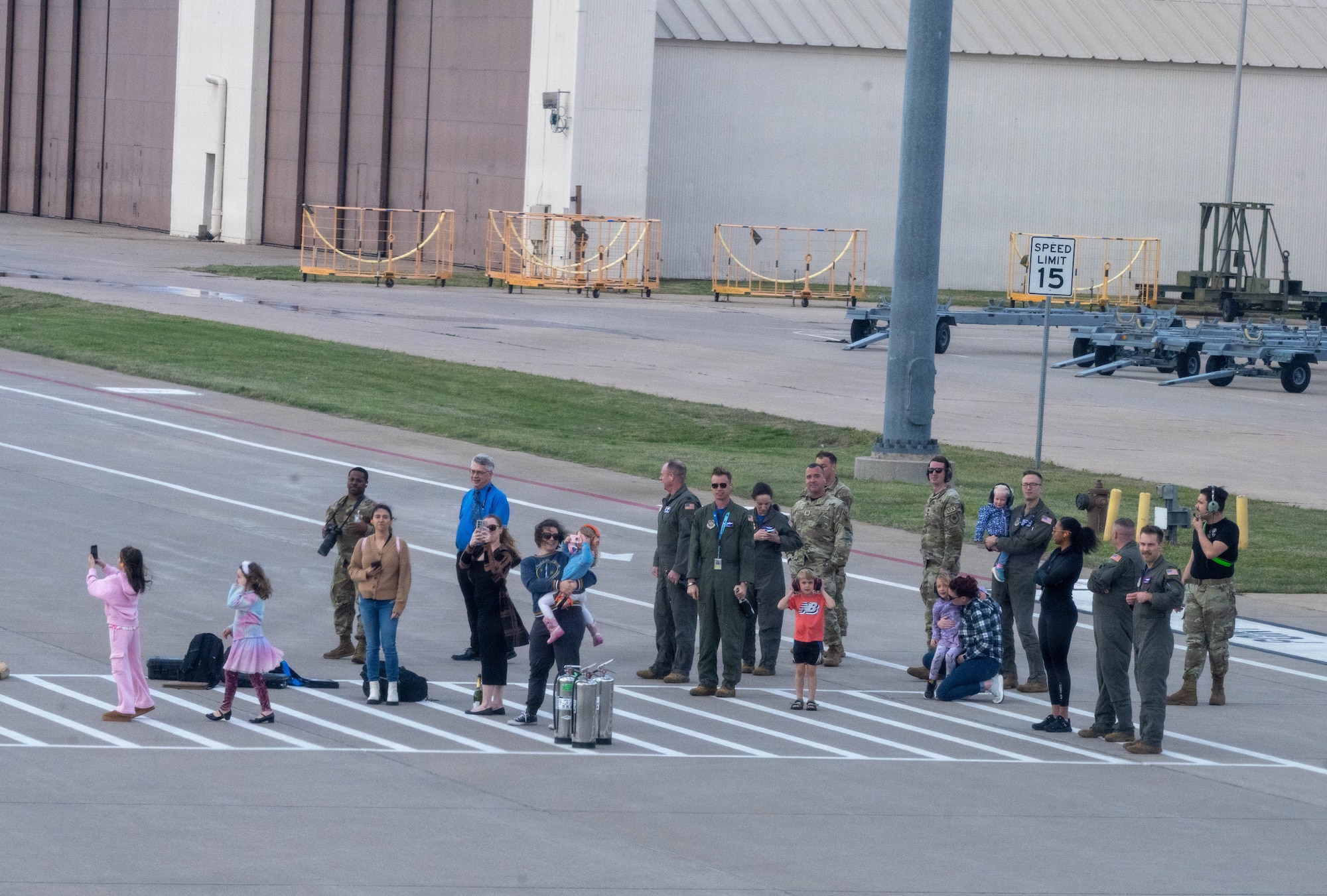 Friends and family of Maj. Kyle Haydel, 22nd Operations Group KC-46A Pegasus pilot, visit him after his final flight with the 22nd Air Refueling Wing at McConnell Air Force Base, Kansas, April 3, 2026. Haydel flew the new 46 home from the Boeing factory in Everett, Washington. (U.S. Air Force photo by Airman 1st Class Patrick O’Neill)