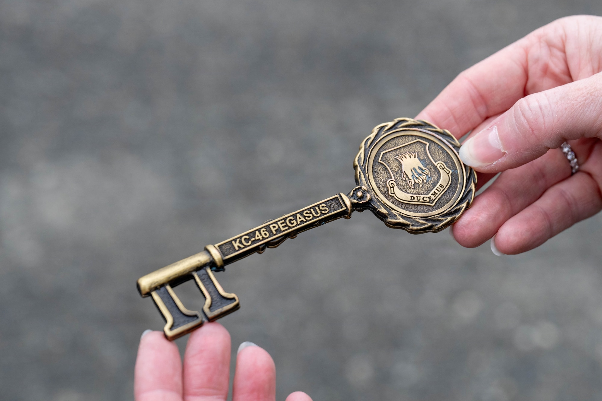 A ceremonial key to a KC-46A Pegasus is presented in Everett, Washington, April 3, 2026. The key was handed to Brig. Gen. Corey Simmons, U.S. Transportation Command director of operations, before flying the new jet. (U.S. Air Force photo by Airman 1st Class Patrick O’Neill)