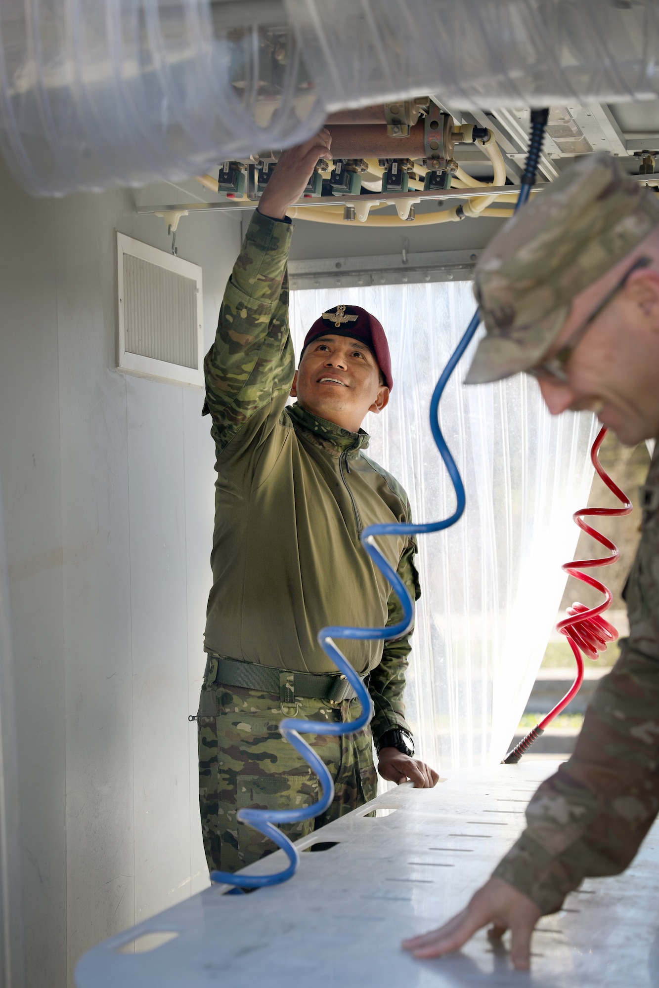 Ecuadorian Army soldiers participate in a State Partnership Program visit with the Kentucky Army National Guard’s 103rd Chemical Battalion at the unit’s readiness center in Burlington, Ky., March 12, 2026. The visit provided an opportunity for partner forces to exchange knowledge, strengthen professional relationships and enhance cooperation between the two militaries. (U.S. Army National Guard photo by Sgt. 1st Class Benjamin Crane)