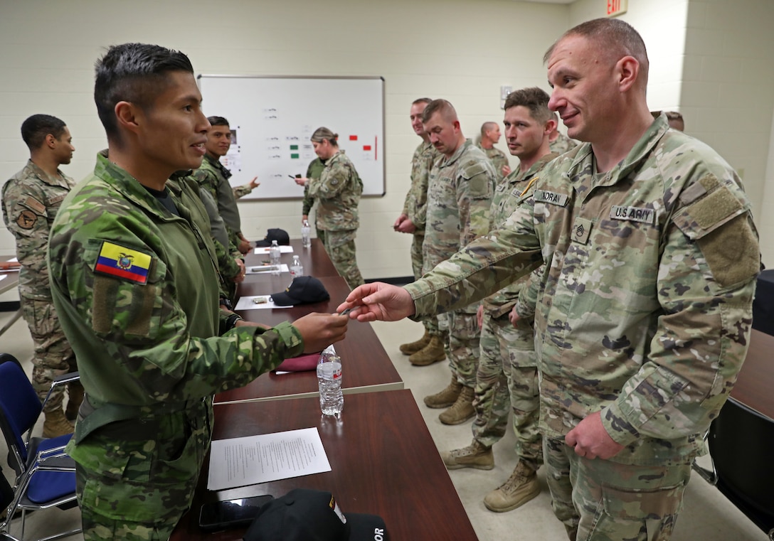 Ecuadorian Army soldiers participate in a State Partnership Program visit with the Kentucky Army National Guard’s 103rd Chemical Battalion at the unit’s readiness center in Burlington, Ky., March 12, 2026. The visit provided an opportunity for partner forces to exchange knowledge, strengthen professional relationships and enhance cooperation between the two militaries. (U.S. Army National Guard photo by Sgt. 1st Class Benjamin Crane)
