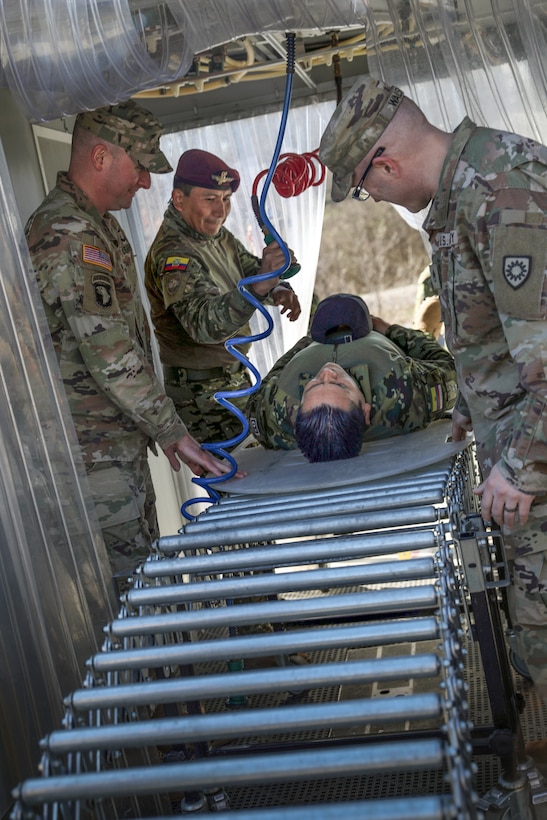 Ecuadorian Army soldiers participate in a State Partnership Program visit with the Kentucky Army National Guard’s 103rd Chemical Battalion at the unit’s readiness center in Burlington, Ky., March 12, 2026. The visit provided an opportunity for partner forces to exchange knowledge, strengthen professional relationships and enhance cooperation between the two militaries. (U.S. Army National Guard photo by Sgt. 1st Class Benjamin Crane)