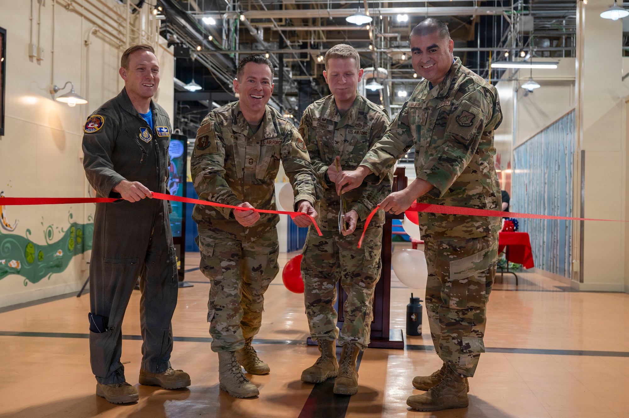 35th Fighter Wing leadership cuts the ribbon during the grand opening of the Bushido Fitness Center at Misawa Air Base, Japan, April 10, 2026. The facility adds new workout space for the installation and helps preserve fitness access while renovations continue at the Potter Fitness Center. (U.S. Air Force photo by Senior Airman Gavin Hameed)