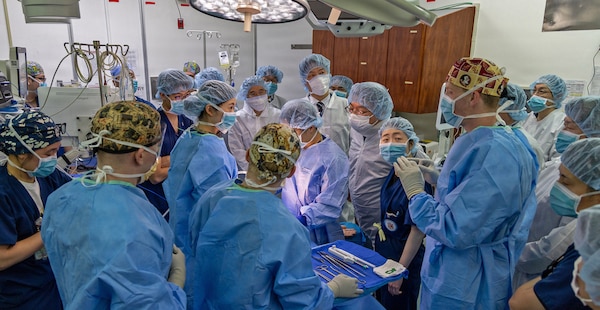 YOKOSUKA, Japan (March 11, 2026) — U.S. Naval Hospital (USNH) Yokosuka and Japan Self-Defense Force (JSDF) Hospital Yokosuka medical personnel conduct simulated surgical procedures using a “cut suit” training system during a bilateral mass casualty drill at USNH Yokosuka. The wearable simulator replicates complex trauma injuries, allowing teams to practice incision, hemorrhage control, and coordinated surgical response in a realistic environment. USNH Yokosuka and JSDF Hospital Yokosuka conducted the drill to enhance joint medical response capabilities and lifesaving procedures in support of a free and open Indo-Pacific. (U.S. Navy photo by Daniel Taylor/U.S. Naval Hospital Yokosuka Public Affairs)