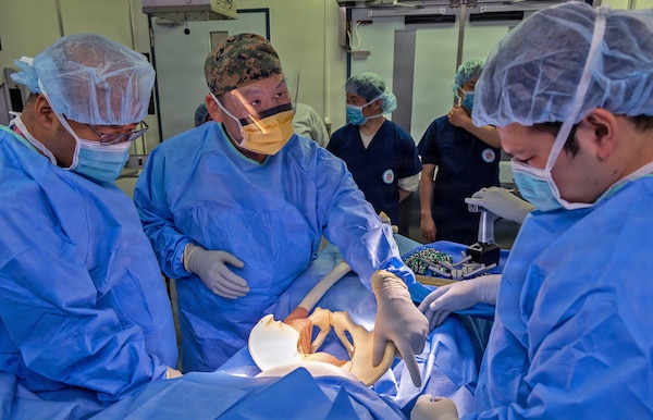 YOKOSUKA, Japan (March 11, 2026) — U.S. Naval Hospital (USNH) Yokosuka and Japan Self-Defense Force (JSDF) Hospital Yokosuka surgical personnel perform a simulated orthopedic procedure during a bilateral mass casualty drill at USNH Yokosuka. USNH Yokosuka and JSDF Hospital Yokosuka conducted the drill to enhance joint medical response capabilities and lifesaving procedures in support of a free and open Indo-Pacific. (U.S. Navy photo by Daniel Taylor/U.S. Naval Hospital Yokosuka Public Affairs)