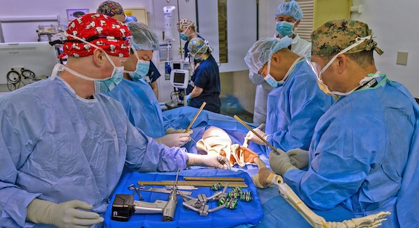 YOKOSUKA, Japan (March 11, 2026) — U.S. Naval Hospital (USNH) Yokosuka and Japan Self-Defense Force (JSDF) Hospital Yokosuka surgical personnel perform a simulated orthopedic procedure during a bilateral mass casualty drill at USNH Yokosuka. USNH Yokosuka and JSDF Hospital Yokosuka conducted the drill to enhance joint medical response capabilities and lifesaving procedures in support of a free and open Indo-Pacific. (U.S. Navy photo by Daniel Taylor/U.S. Naval Hospital Yokosuka Public Affairs)