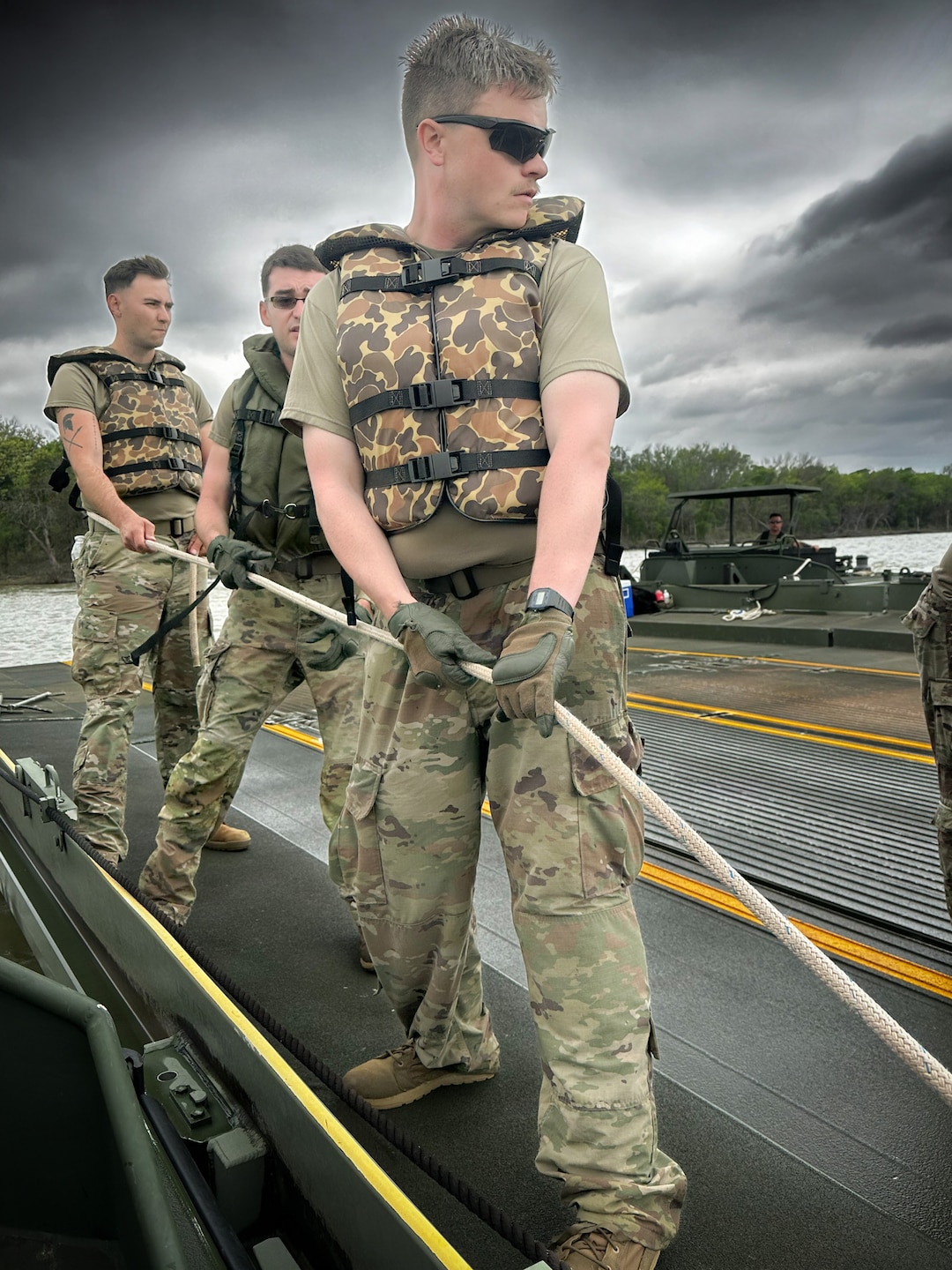 U.S. Army Reserve Soldiers from the 401st Engineer Company conduct multi-role bridging training operations at Bardwell Lake in Texas. The exercise focuses on wet gap crossing techniques, including ribbon bridge and raft operations, enabling the transport of vehicles, equipment, and personnel across water obstacles. The training integrates new Soldiers fresh from Advanced Individual Training (AIT) alongside experienced Noncommissioned Officers, enhancing readiness, morale, and technical proficiency. Conducted in partnership with the U.S. Army Corps of Engineers (USACE), the field training exercise highlights the importance of interagency collaboration and access to USACE-managed resources for realistic, mission-essential training environments.