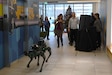 Ms. Kilgore and Hon. Ingraham walking with CSIRP Robot Dogs during CPE CBRND visit.