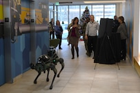 Ms. Kilgore and Hon. Ingraham walking with CSIRP Robot Dogs during CPE CBRND visit.