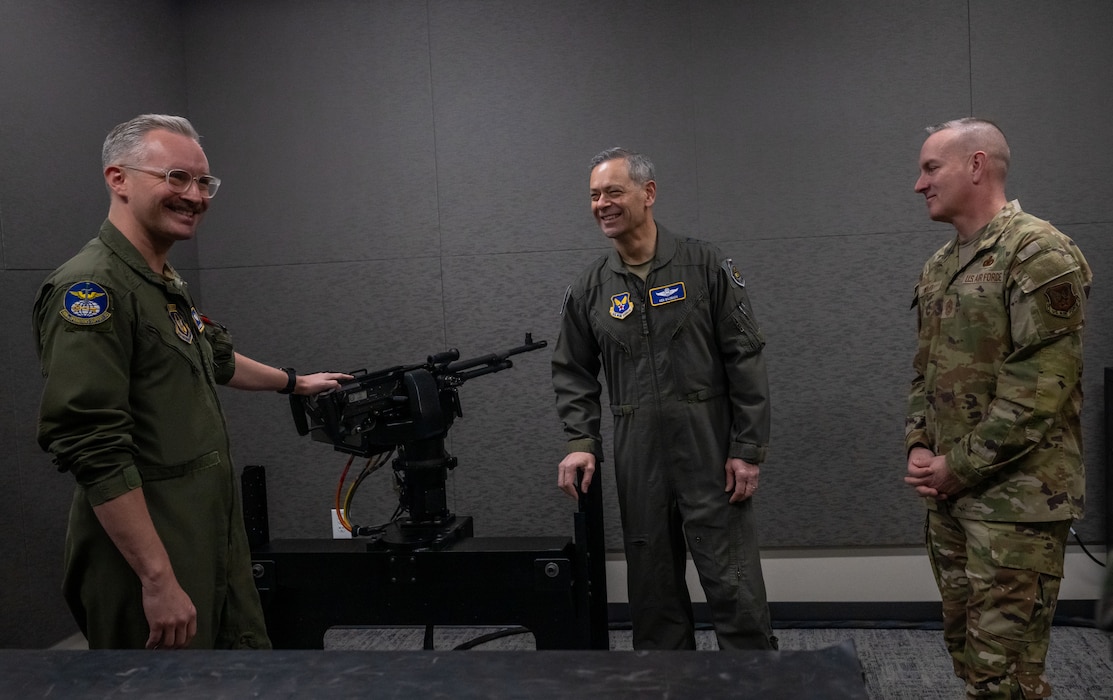 People discuss a training device