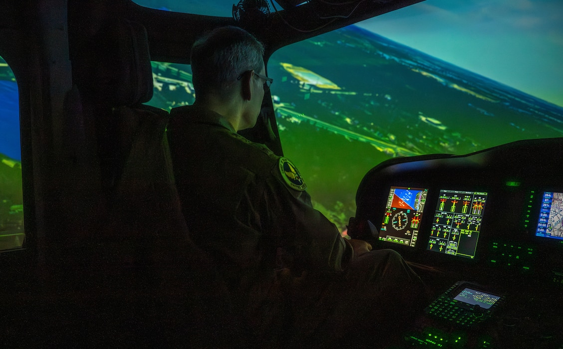 A person uses a simulator