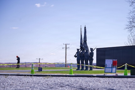 A contractor works at the U.S. Air Force Memorial during a periodic cleaning operation in Arlington, Va., March 24, 2026. In 1993, the U.S. Congress authorized the creation of a memorial honoring the men and women who served in the U.S. Air Force and its predecessors. (U.S. Air Force photo by Airman 1st Class Brandon Thomas)