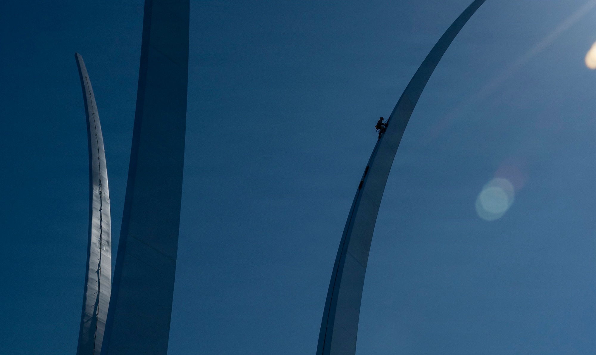 A technician inspects the U.S. Air Force Memorial, Arlington, Va., March 24, 2026. Completed in 2006, the memorial undergoes cleaning and inspection every five years to preserve the structure’s appearance and integrity. (U.S Air Force photo by Airman 1st Class Arlene Carrara)