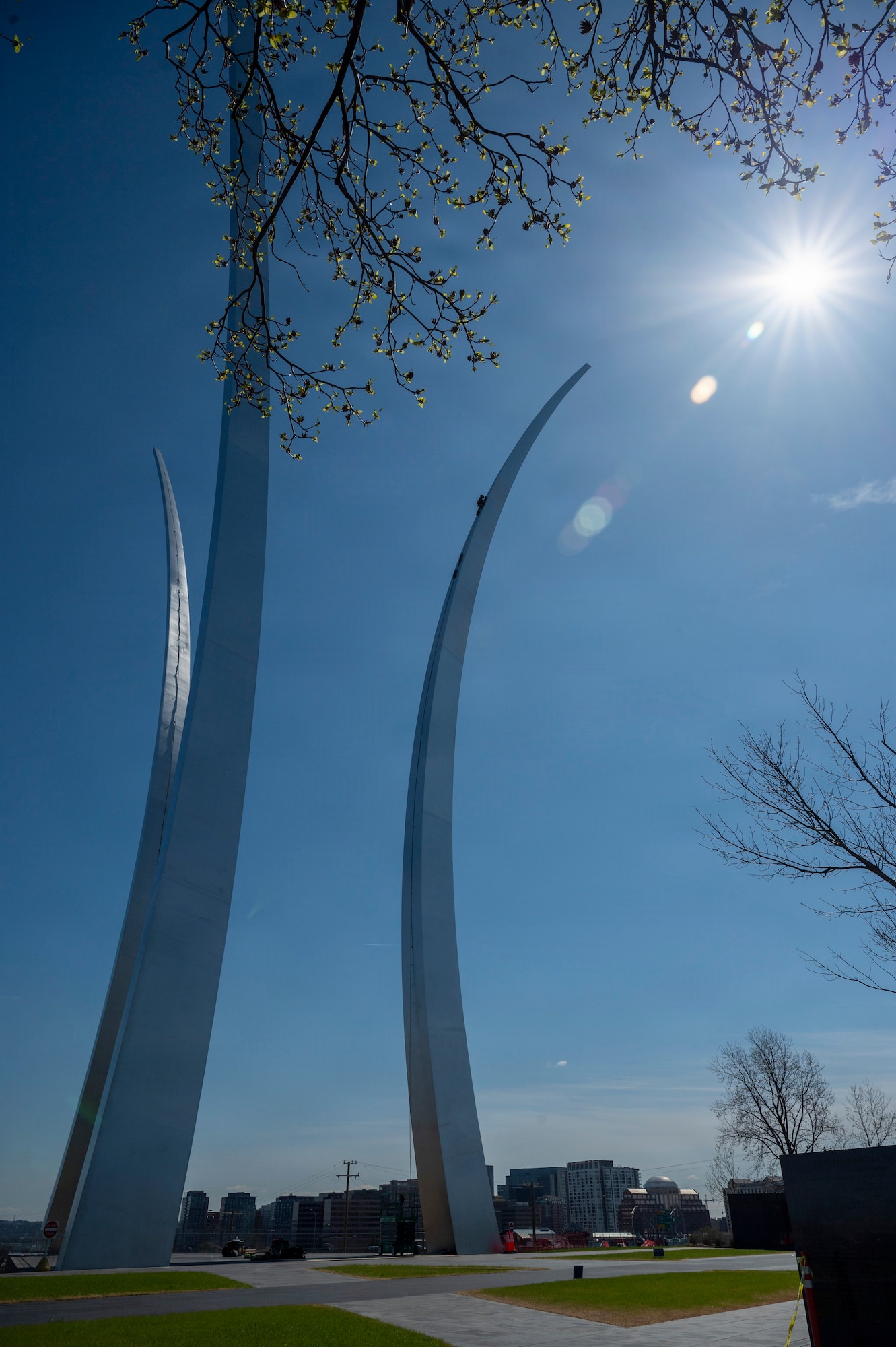 A technician prepares spires for cleaning and inspection at the U.S. Air Force Memorial, Arlington, Va., March 24, 2026. The spires were designed to represent the jet contrails created by the U.S. Air Force Thunderbirds during the “bomb burst” aerial maneuver. (U.S Air Force photo by Airman 1st Class Arlene Carrara)
