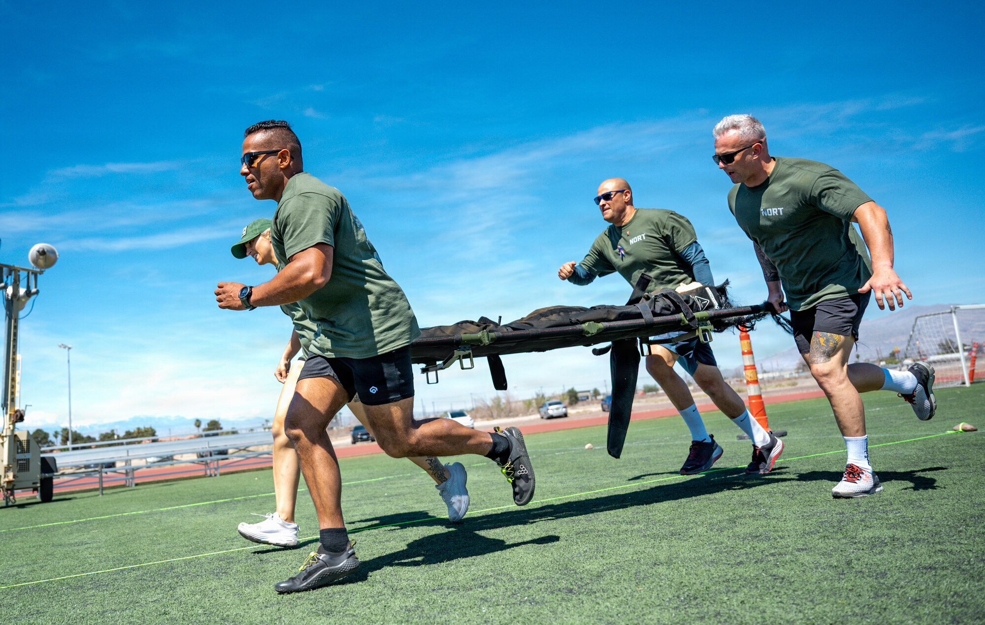 People running with gurney