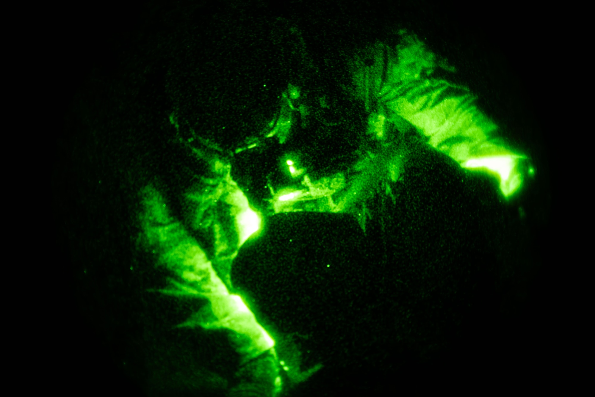 A U.S. Air Force pararescueman assigned to the 68th Rescue Squadron provides medical care to a simulated casualty during the Combat Leader Course at Davis-Monthan Air Force Base, Arizona, April 10, 2026. Pararescuemen applied tactical combat casualty care procedures to stabilize the patient before evacuation. (U.S. Air Force photo by Airman 1st Class Jaden Kidd)