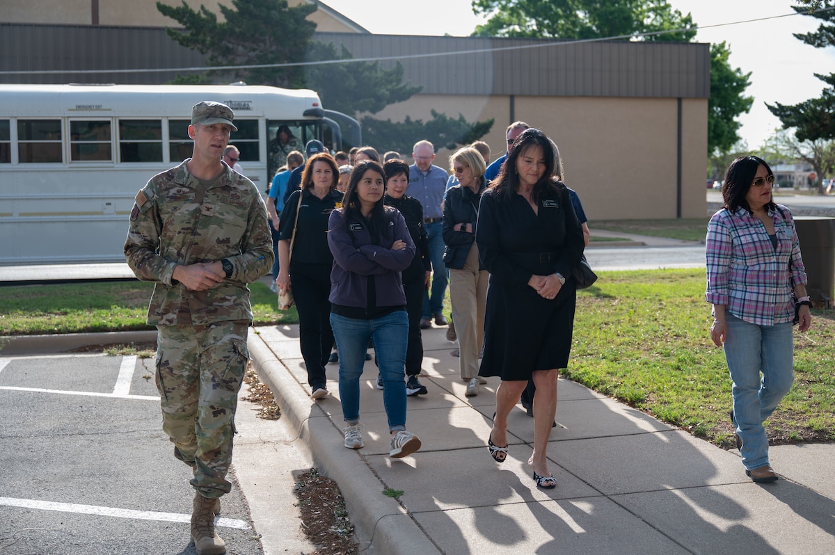 U.S. Air Force Col. Nathan Olsen, 17th Mission Support Group commander, walks with the honorary commanders during the 17th MSG immersion at Goodfellow Air Force Base, Texas, April 9, 2026. The immersion provided community leaders with insight into base operations and mission support functions. (U.S. Air Force photo by Senior Airman James Salellas)