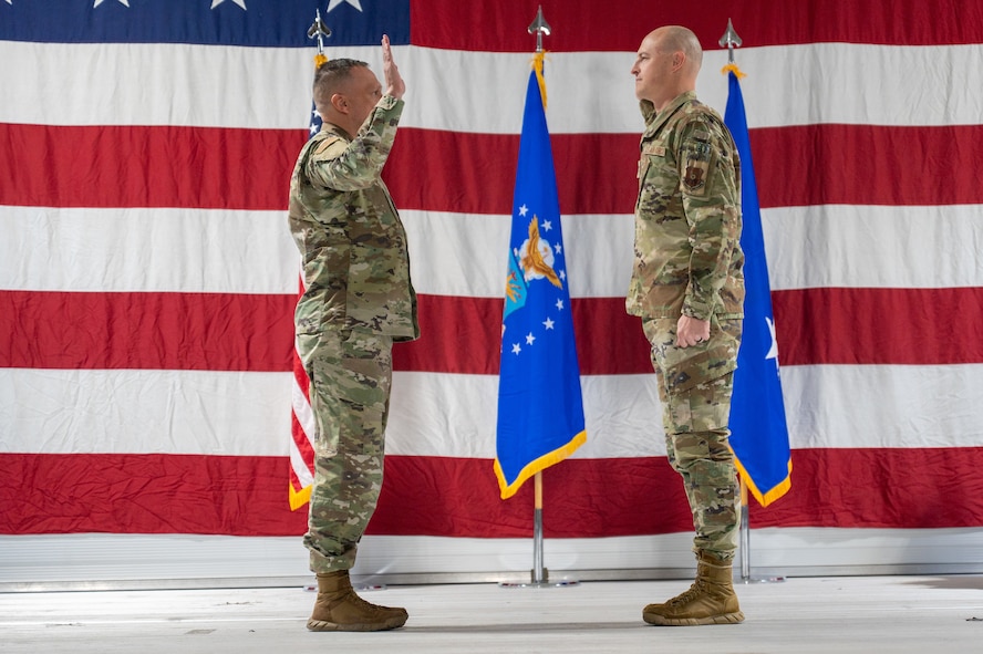 U.S. Air Force Maj. Gen. Lyle Drew, director Defense Threat Reduction Agency, promotes U.S. Air Force Col. Robert E. Wake, assigned to the Healthcare Operations Squadron 5th Medical Group at Minot Air Force Base, North Dakota, March 31, 2026. Wake was promoted to Colonel and was selected to attend Air War college.