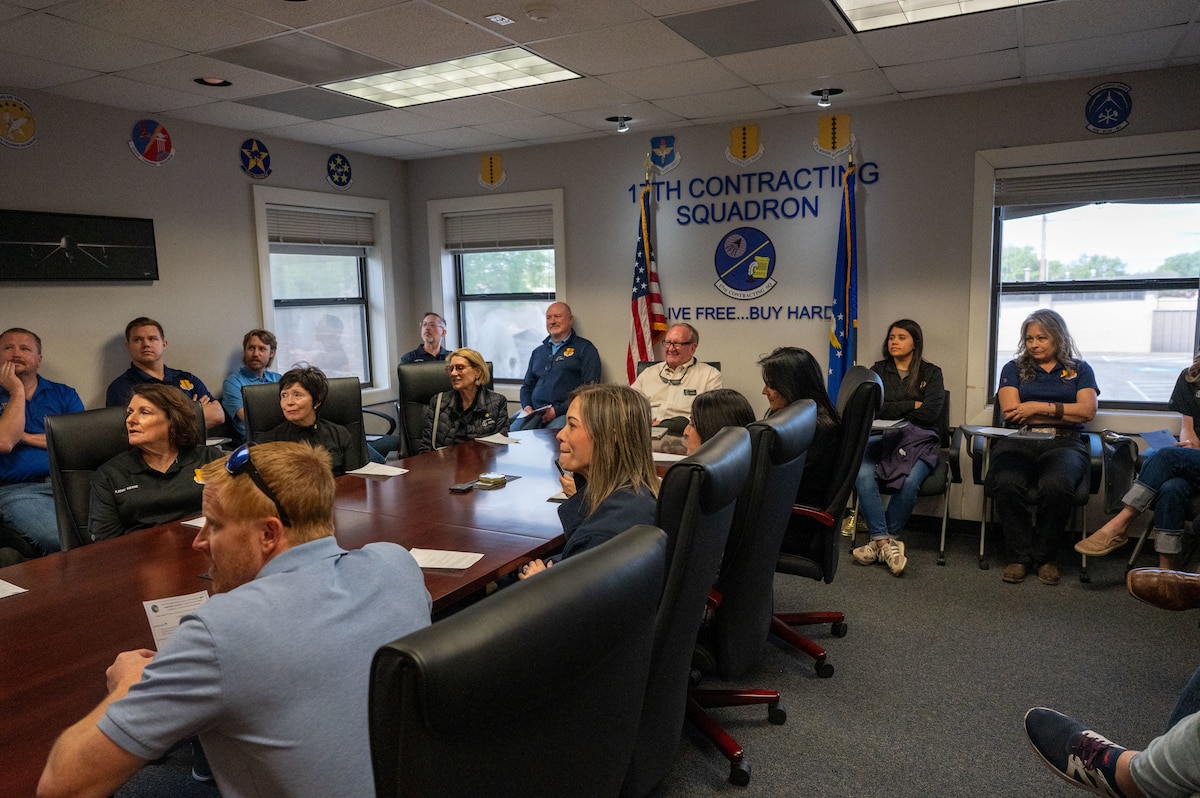 Honorary commanders receive a briefing from the 17th Contracting Squadron during the 17th Mission Support Group immersion at Goodfellow Air Force Base, Texas, April 9, 2026. The briefing explained how contracting supports mission requirements and community partnerships. (U.S. Air Force photo by Senior Airman James Salellas)