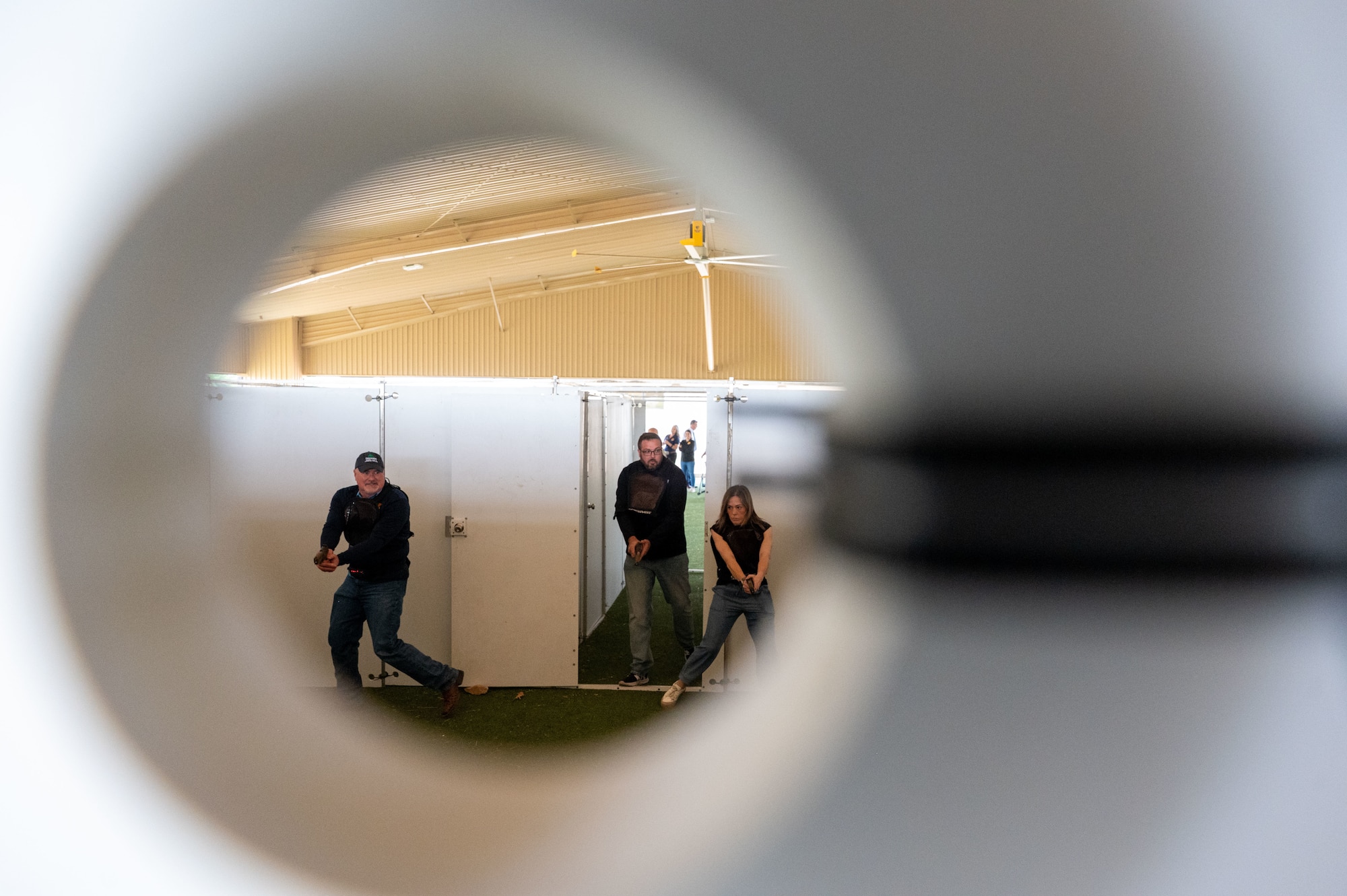 Honorary commanders participate in a shoot-house scenario with the 17th Security Forces Squadron during the 17th Mission Support Group immersion at Goodfellow Air Force Base, Texas, April 9, 2026. The experience provided insight into defender training and decision-making. (U.S. Air Force photo by Senior Airman James Salellas)