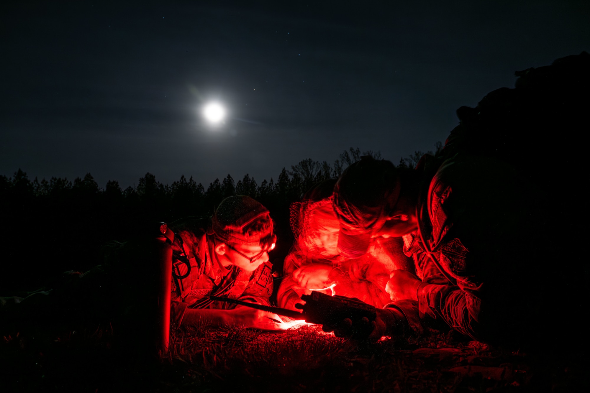 security forces airmen train on nighttime land navigation