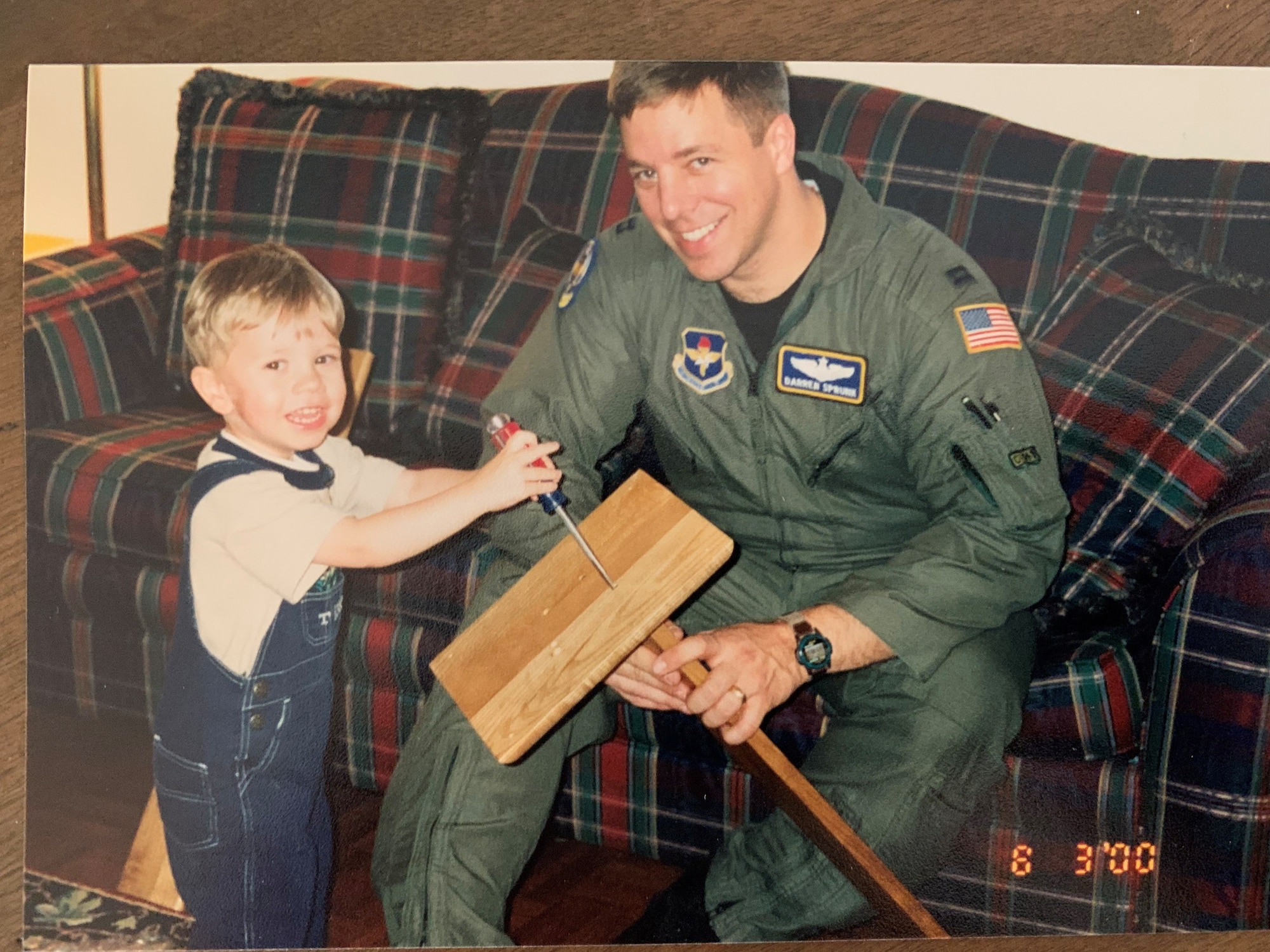 A military family poses for a photo