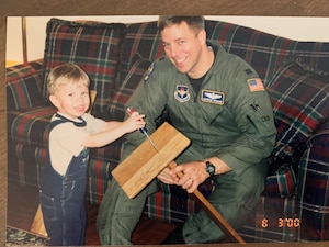 A military family poses for a photo