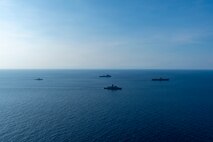 From left: Philippine Coast Guard Teresa Magbanua-class patrol vessel BRP Melchora Aquino (MRRV-9702), U.S. Navy Whidbey Island-class dock landing ship USS Ashland (LSD 48), Royal Australian Navy Anzac-class frigate HMAS Toowoomba (FF 156), and U.S. 7th Fleet flagship USS Blue Ridge (LCC 19) conduct a group sail during a multilateral exercise with the Armed Forces of the Philippines and Royal Australian Navy in the Sulu Sea, April 13, 2026.