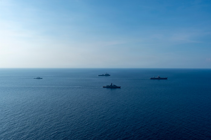 From left: Philippine Coast Guard Teresa Magbanua-class patrol vessel BRP Melchora Aquino (MRRV-9702), U.S. Navy Whidbey Island-class dock landing ship USS Ashland (LSD 48), Royal Australian Navy Anzac-class frigate HMAS Toowoomba (FF 156), and U.S. 7th Fleet flagship USS Blue Ridge (LCC 19) conduct a group sail during a multilateral exercise with the Armed Forces of the Philippines and Royal Australian Navy in the Sulu Sea, April 13, 2026.